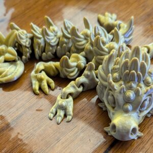 Baby Dragon, Gold Regal